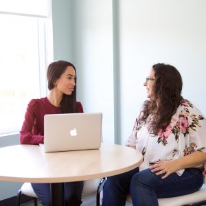 NutriProCan Weight Loss dietitian sitting with a clientCoaching