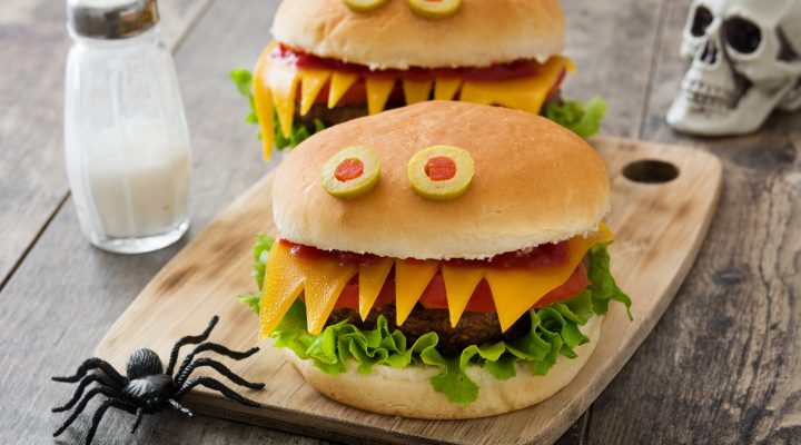 Halloween hamburgers on a cutting board