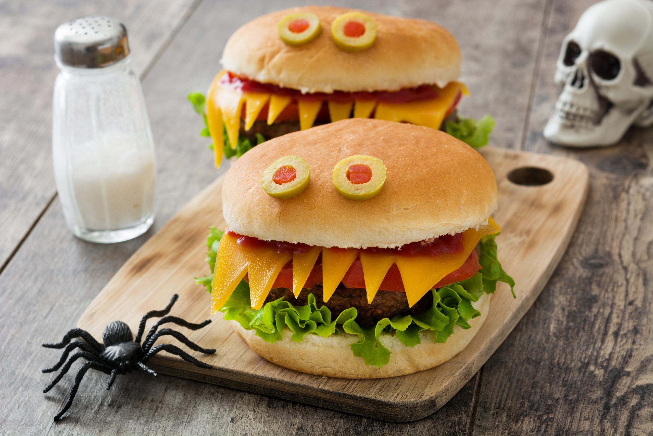 Halloween hamburgers on a cutting board